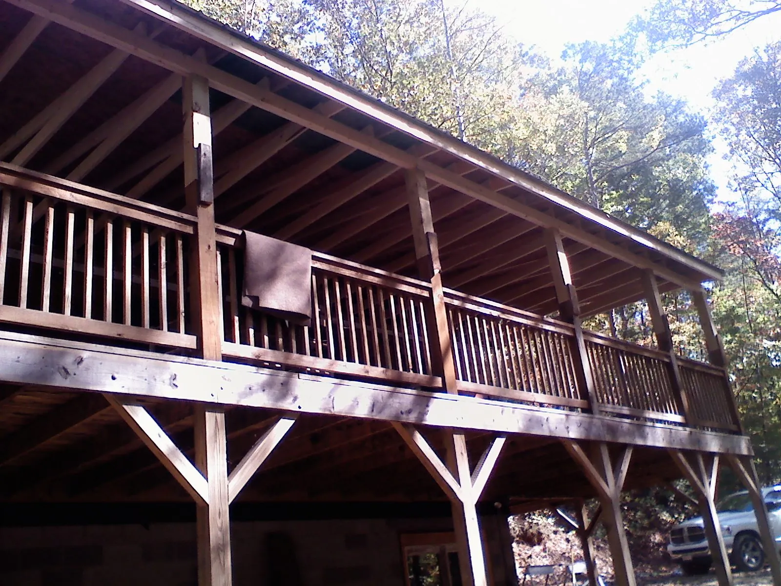Timber framing under a new elevated porch and deck — Roof Leak Repair in Howell by Roofing Brothers